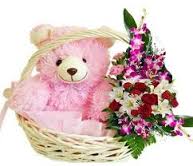 Basket of flowers with 1 foot teddy