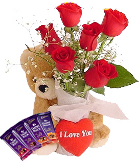 Teddy bear (6 inches ) and 6 Red roses 4 silk and Heart