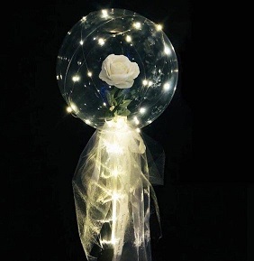 Clear transparent bubble with white rose white wrapping