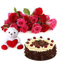 12 red roses with 6 inch Teddy and Half Kg black forest cake