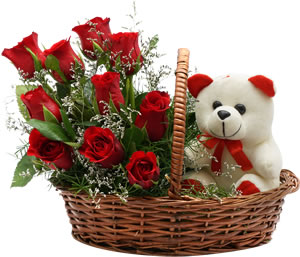 8 Red roses with 6 inches Teddy in a handle Basket